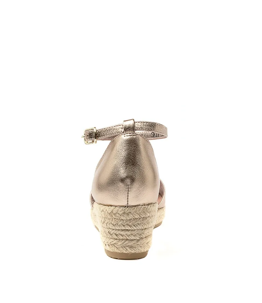 Skip Champagne Leather